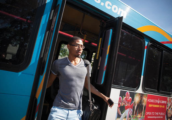 Ulysses Smith '13, AAP student and Student Assembly (SASSM) member, on the bus.
