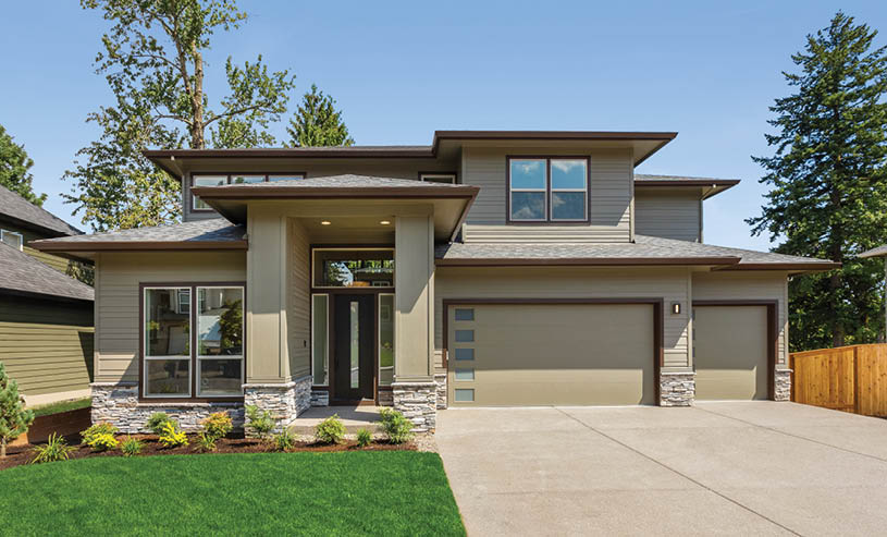 Facade of home with manicured lawn