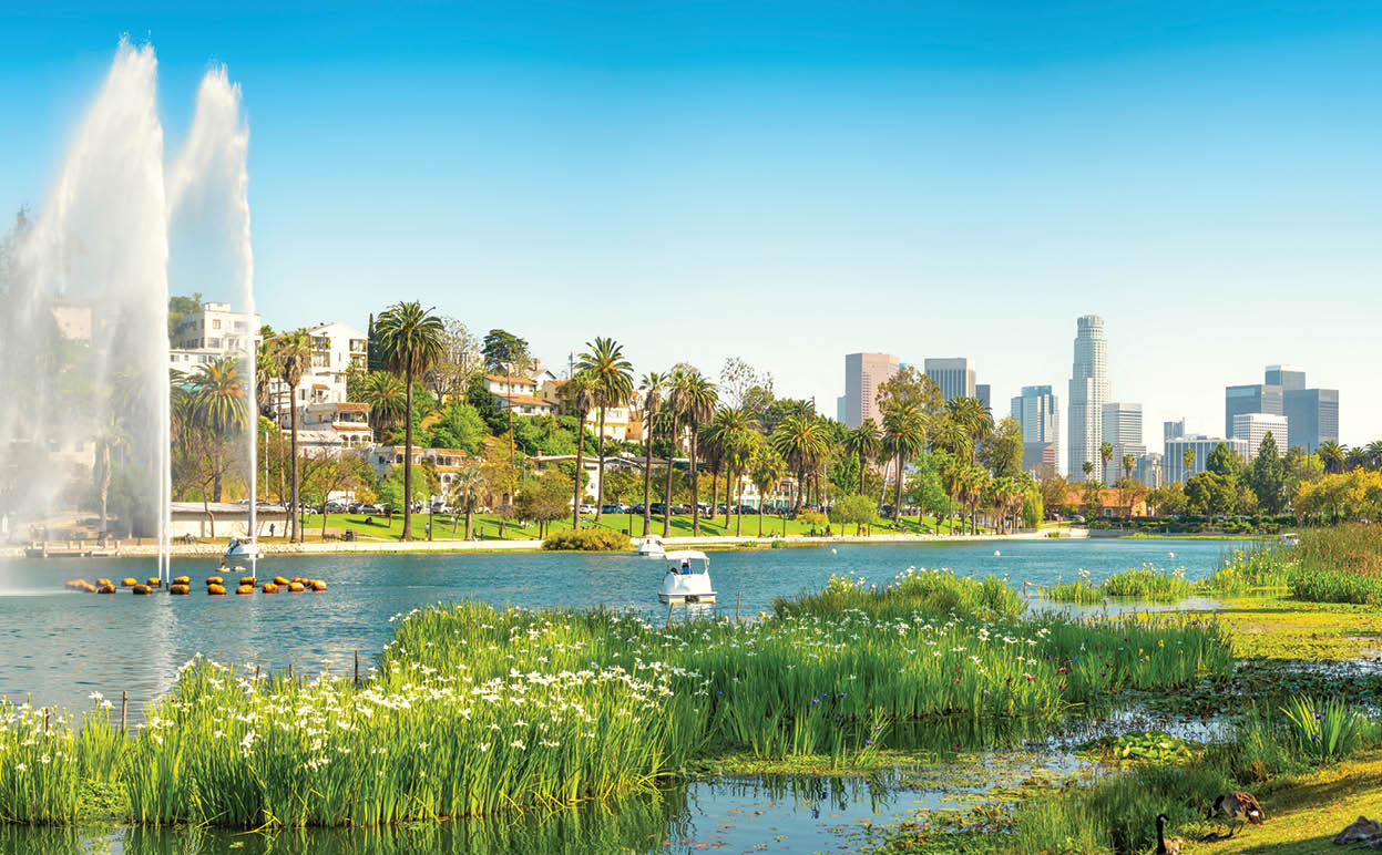 the beautiful echo park of los angeles with the skyline im the background