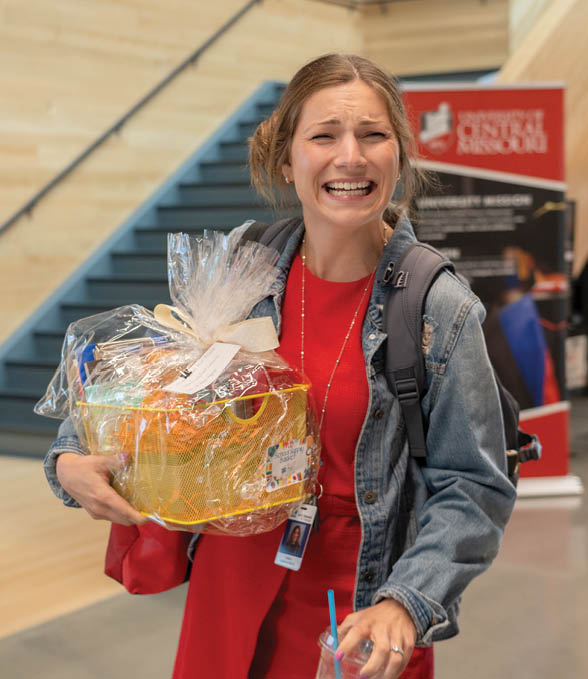 A woman in a red shirt is holding a basket with a ribbon on it. AI generated content