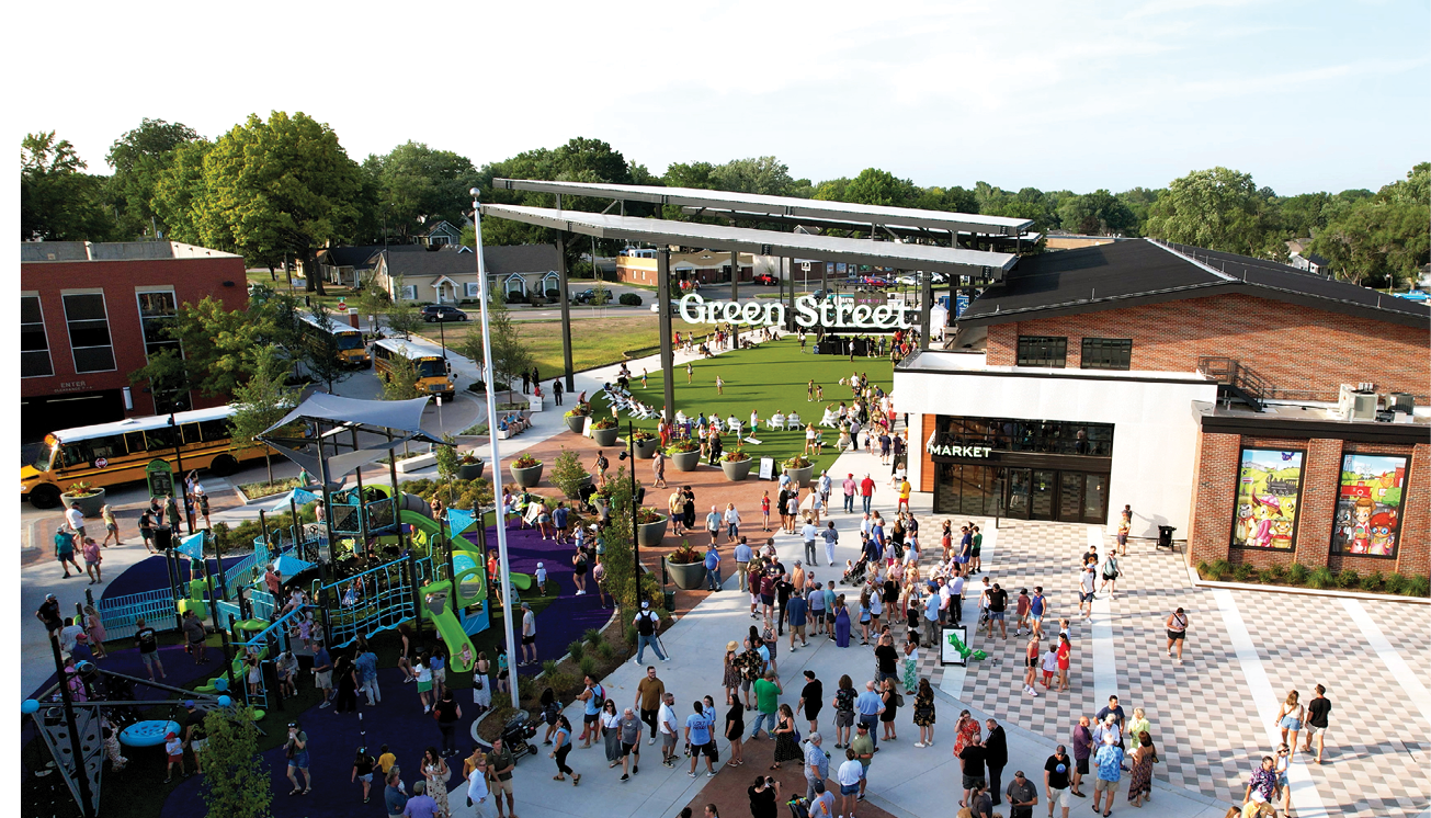 A large group of people are gathered in a plaza, walking around and enjoying the outdoors. AI generated content
