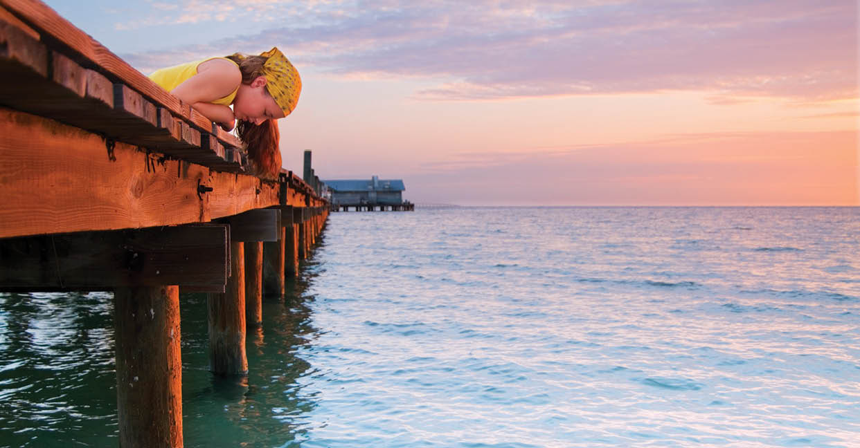 Young girl on Anna Maria Island Pier.