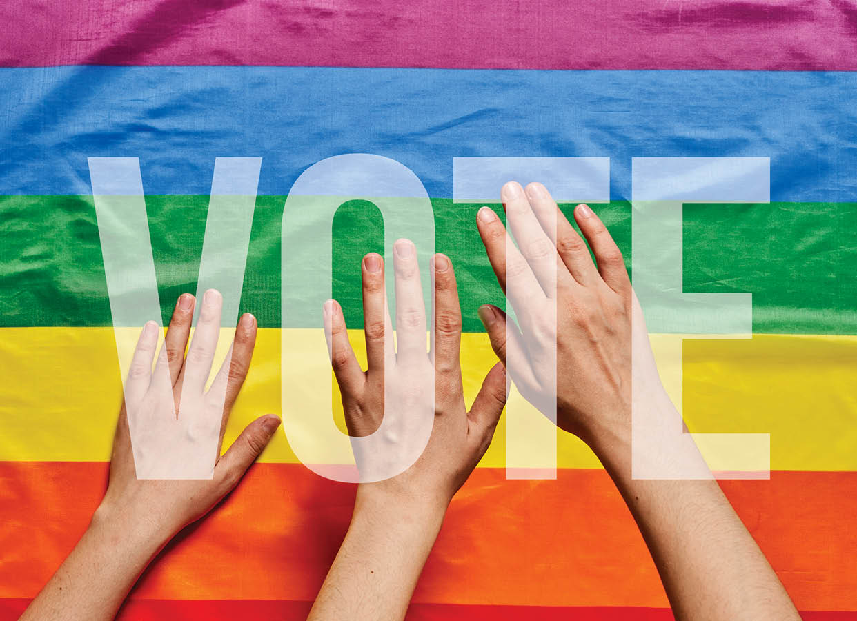 LGBT people voting. LGBT Elections. Hands of people on LGBT flag background