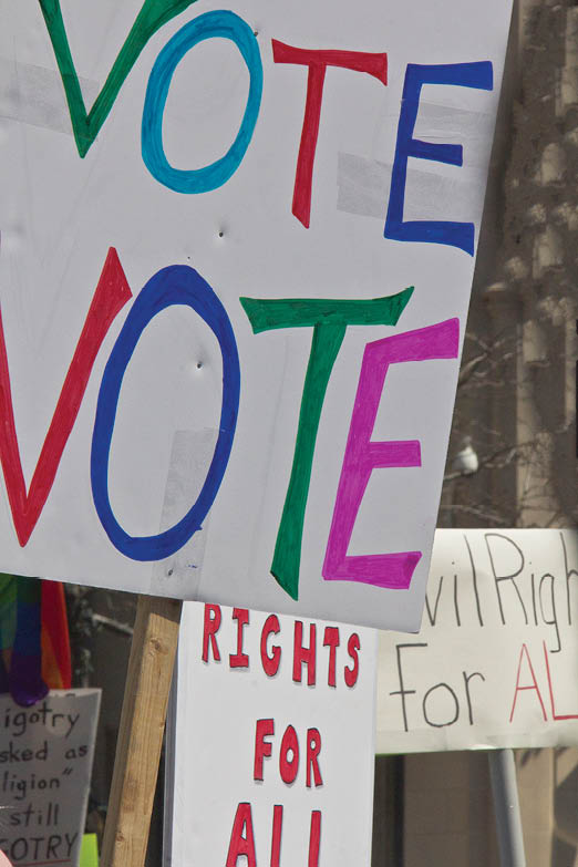 Different signs were raised during a rally against the RFRA in Indianapolis. The demonstration is calling for equality for all hoosiers and protection for the LGBTQ community across the state of Indiana.