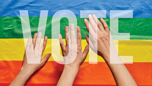 LGBT people voting. LGBT Elections. Hands of people on LGBT flag background