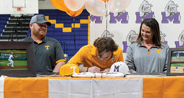 Midland High's Tyler Wade signs his commitment to play for the University of Tennessee during a ceremony Tuesday, Nov. 27, 2018, at the MHS gym. TREVOR HAWES/MIDLAND ISD