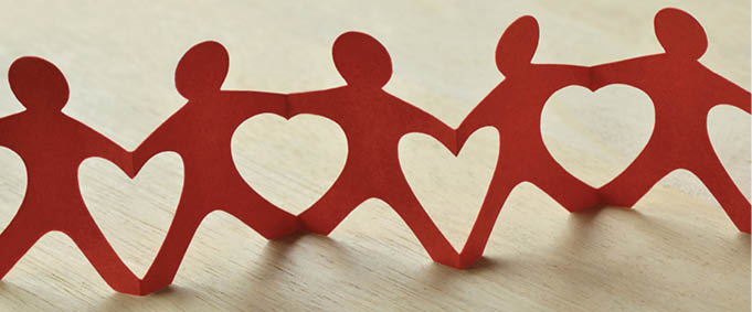Paper people chain with hearts - Teamwork and love concept