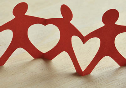 Paper people chain with hearts - Teamwork and love concept