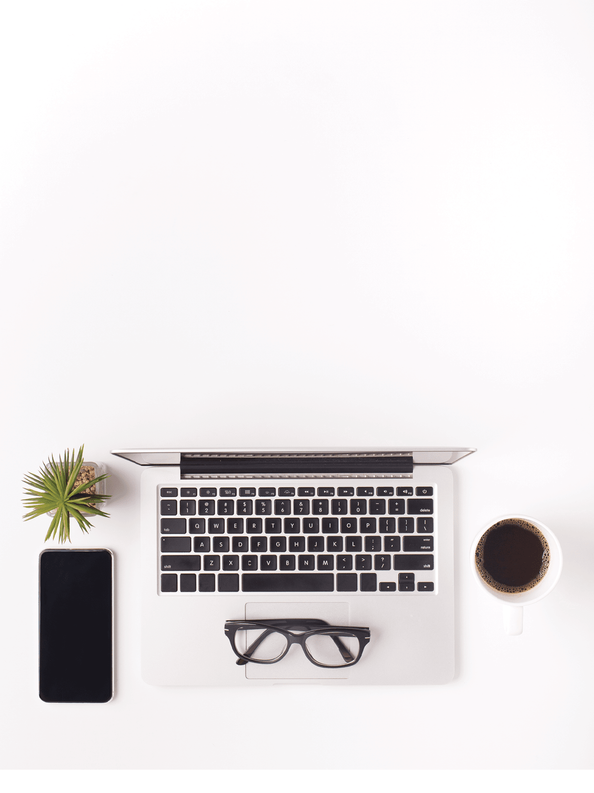 Top view of ordered desktop with laptop, coffee and cellphone with blank screen on white background, copy space