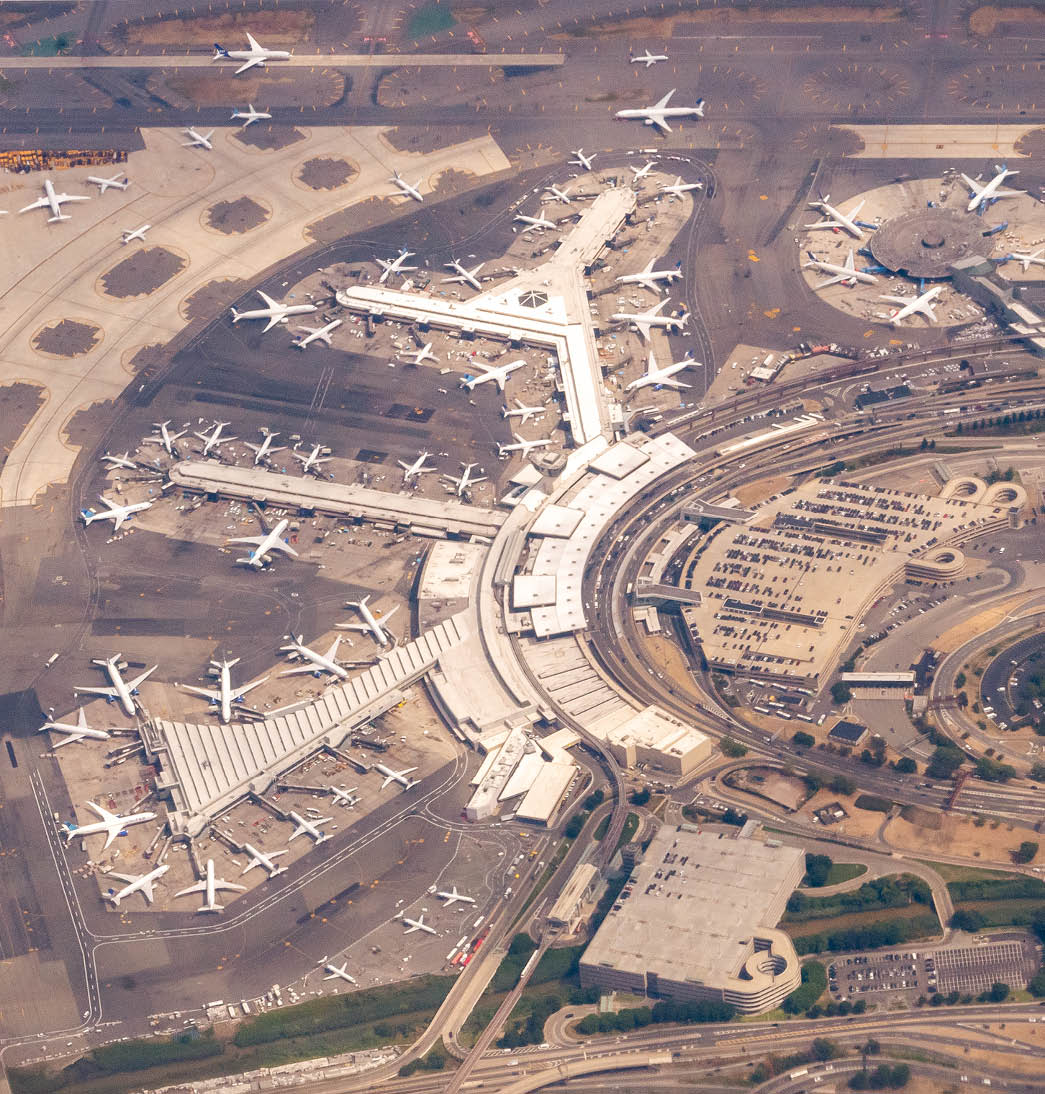 8/17/2022 - Newark Liberty Airport, Newark, New Jersey, USA - An aerial view of Newark Liberty Airport showing terminals planes and the runways.