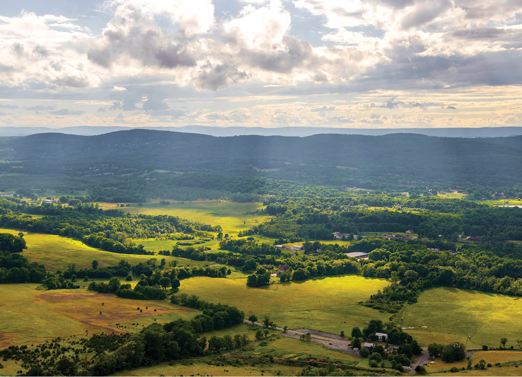 Sun rays over Vernon, New Jersey landscape viewed from Pinwheel Vista