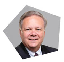 A man wearing a suit and tie is smiling for the camera. AI generated content