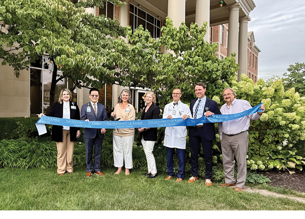 A group of people are standing in front of a building, posing for a picture. They are wearing suits and ties, and some of them are holding blue ribbons. AI generated content
