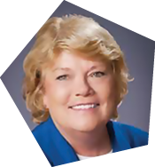 A woman in a blue jacket and white shirt is smiling for the camera. AI generated content