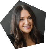 A woman in a black jacket and black pants is smiling and posing for a picture. AI generated content