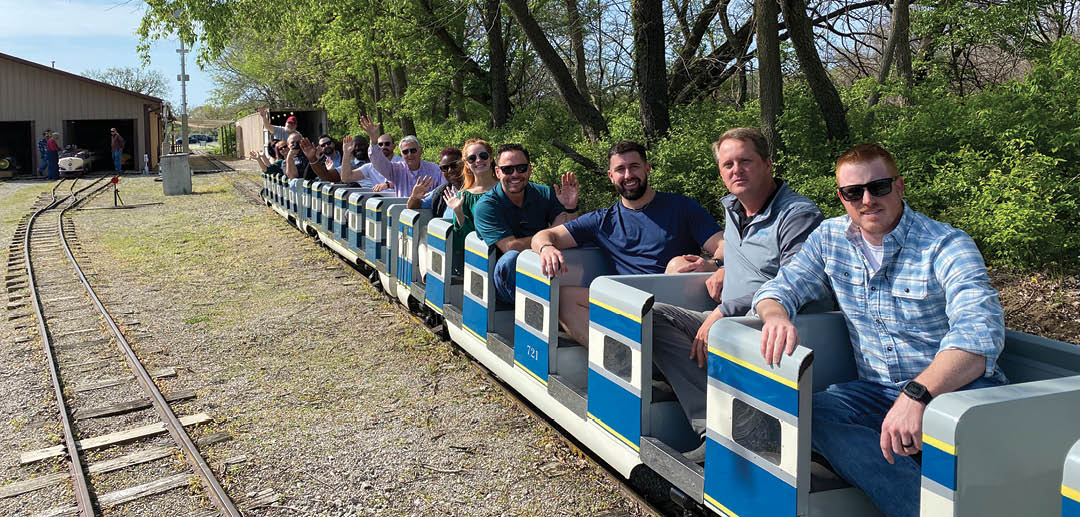 A group of people are sitting on a train, enjoying the ride. AI generated content