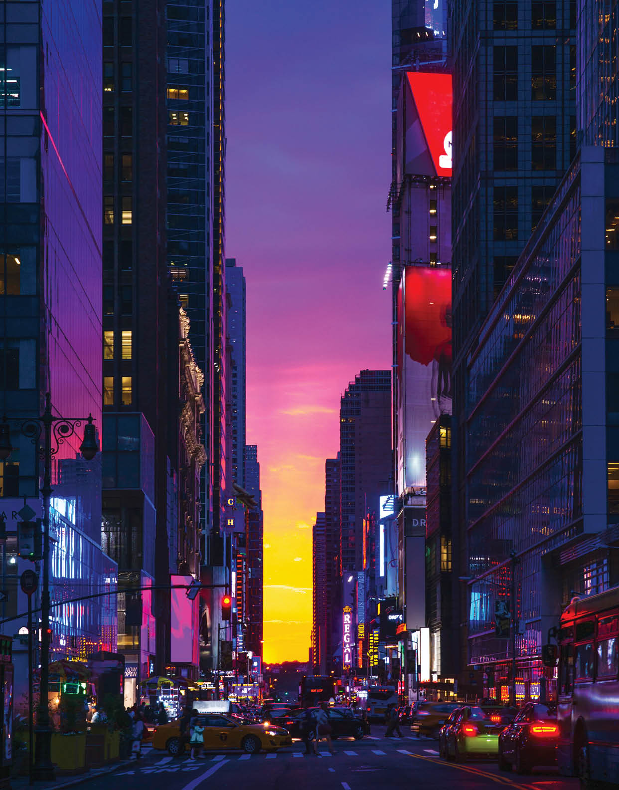 New York 42nd Street in Colorful Rainbow Toned Sunset background, showing cars stopping at a red light on 6th Avenue, people crossing the street, and glass office tower facades reflecting the colorful sky juxtaposed with lit up LED display panels and signages 