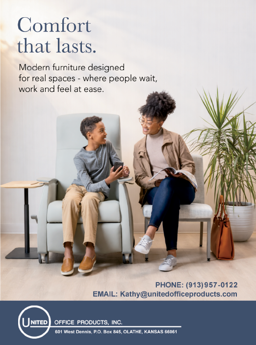 A woman and a boy are sitting on chairs, with the woman holding a book. The woman is wearing a brown jacket. AI generated content