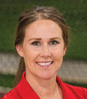 A woman wearing a red shirt and a watch is posing for a picture. AI generated content