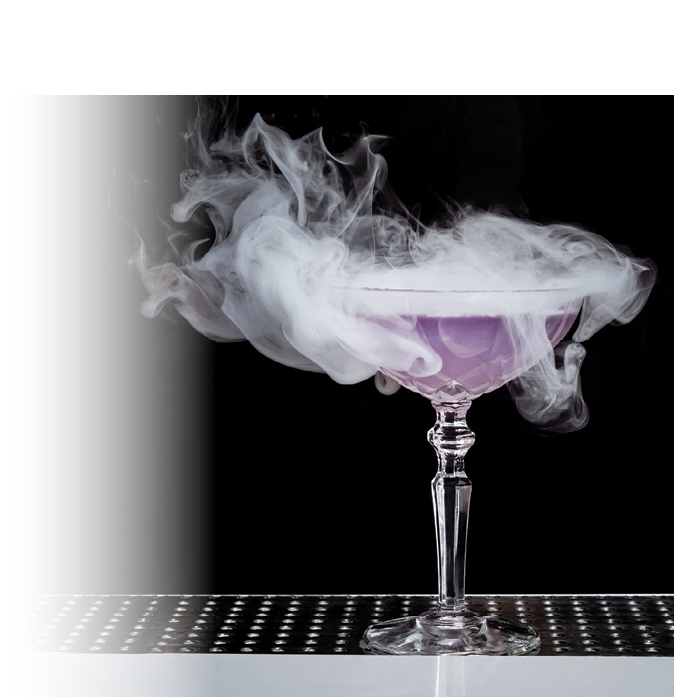 A glass of purple liquid with smoke coming out of it. Description generated by AI
