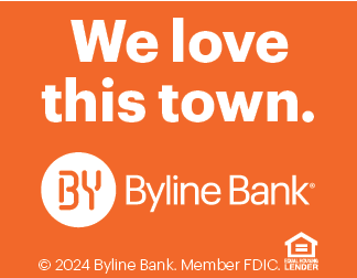 Orange and white sign that says “We Love This Town. Byline Bank." Description generated by AI