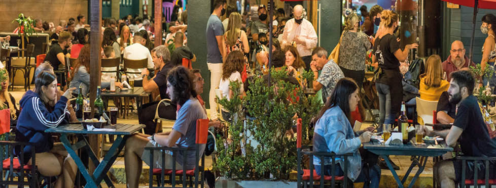 Necochea, Buenos Aires, Argentina. January 9, 2021. A restaurant in the beach of Necochea, full of people (inside and outside)