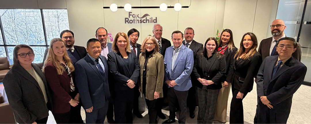 A group of people in a conference room, posing for a picture. AI generated content