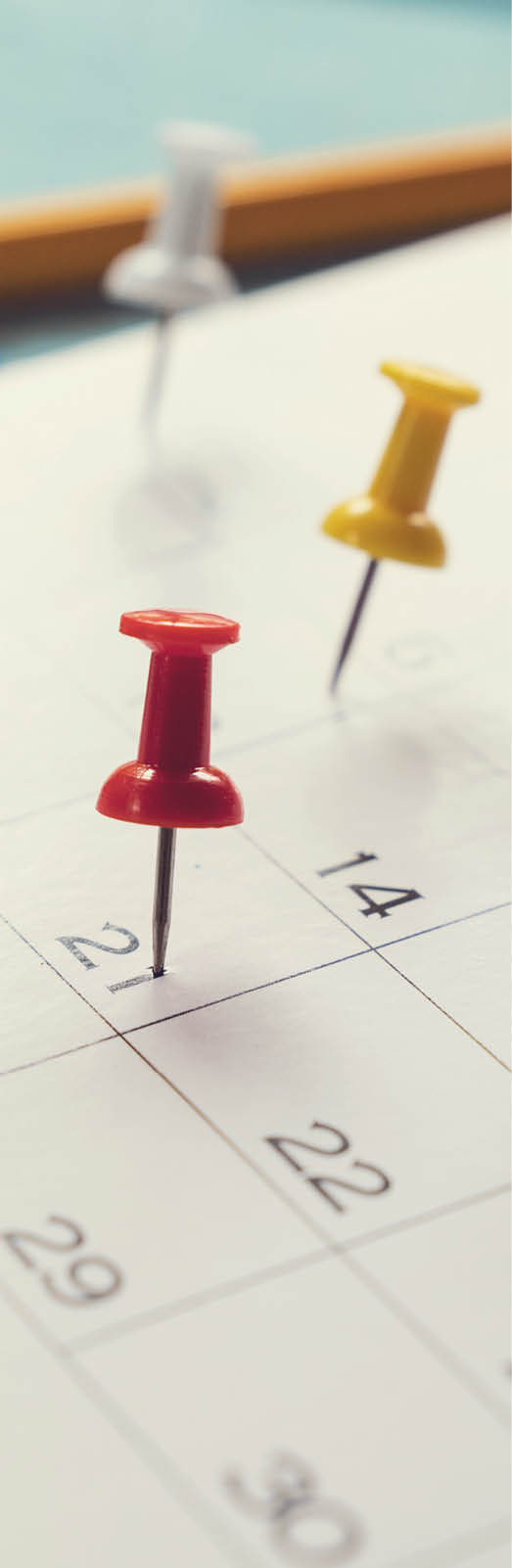 close up of calendar on the table, planning for business meeting or travel planning concept