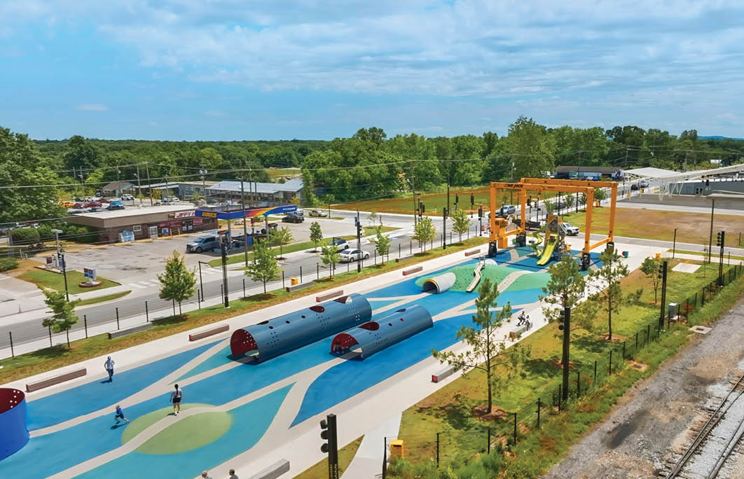 A park with a playground and a train track. AI generated content