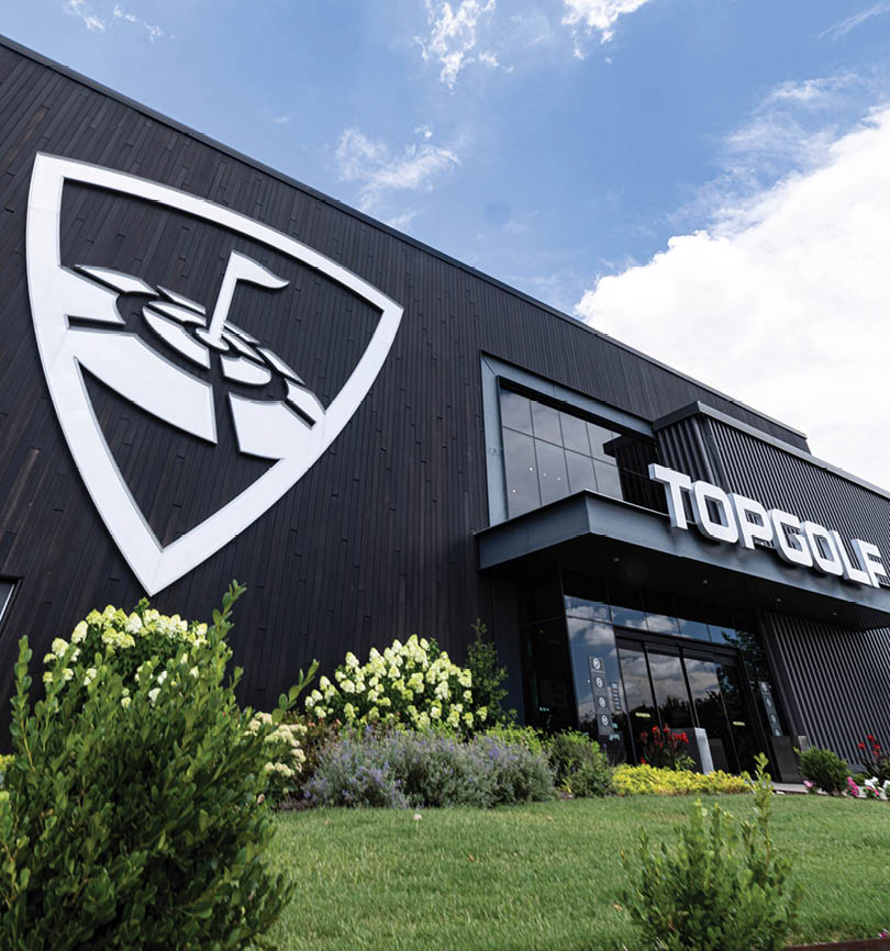 A black building with a white logo on it. AI generated content