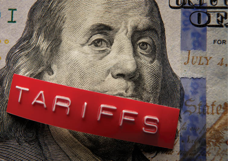 Red Tariffs label on a hundred dollar bill