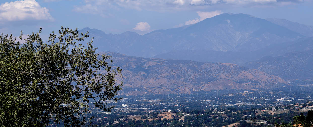 A snapshot of cumulus clouds towering above the San Gabriel Mountains in California.