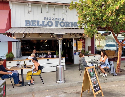 Photos provided by the Visalia Lifestyle Magazine in Santa Maria. This image is of Pizzeria Bello Forno in Old Town Orcutt has added seating along the sidewalk and parked its pizza oven food truck nearby in order to have safely distanced outdoor dining as well as true artisan wood fired pizza for curbside pickup
