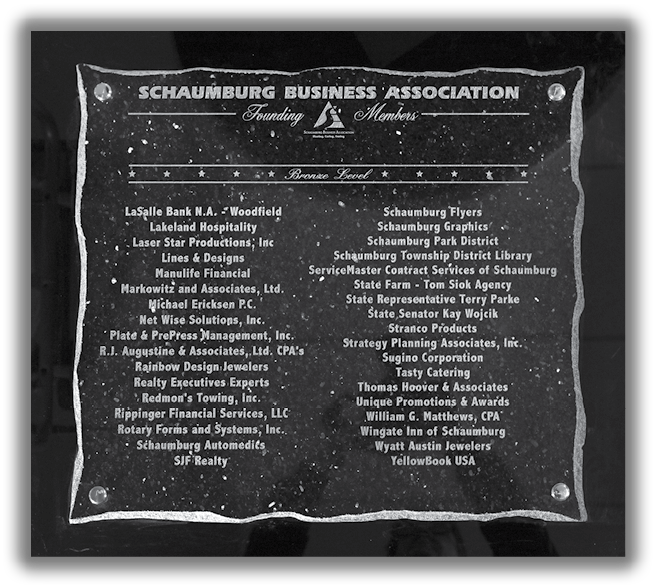 Historical photos of plaques, photos and directory covers to celebrate the Schaumburg Business Association Anniversay.