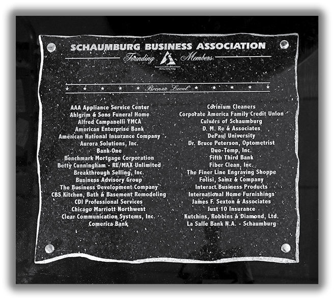 Historical photos of plaques, photos and directory covers to celebrate the Schaumburg Business Association Anniversay.