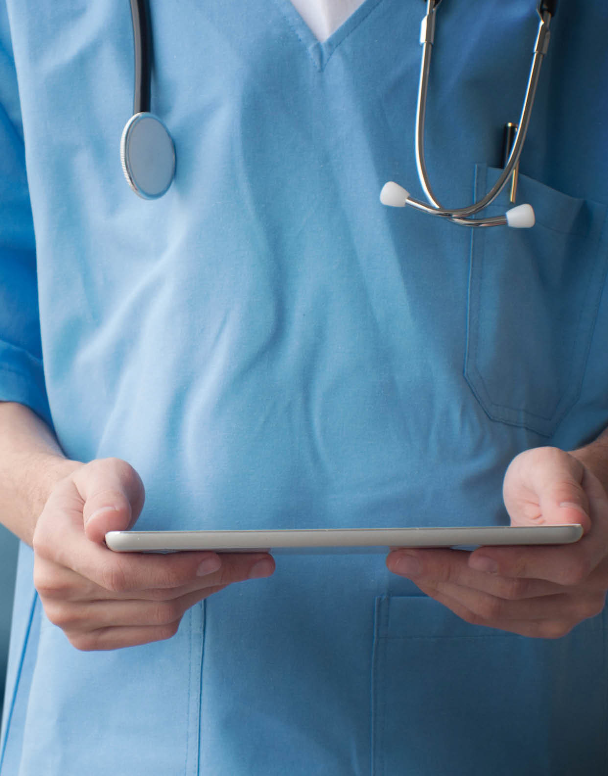 Healthcare And Medicine. Doctor using a digital tablet