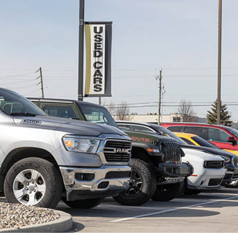 Indianapolis - Circa March 2023: Used car display at a dealership. With supply issues, used and preowned cars are in high demand.