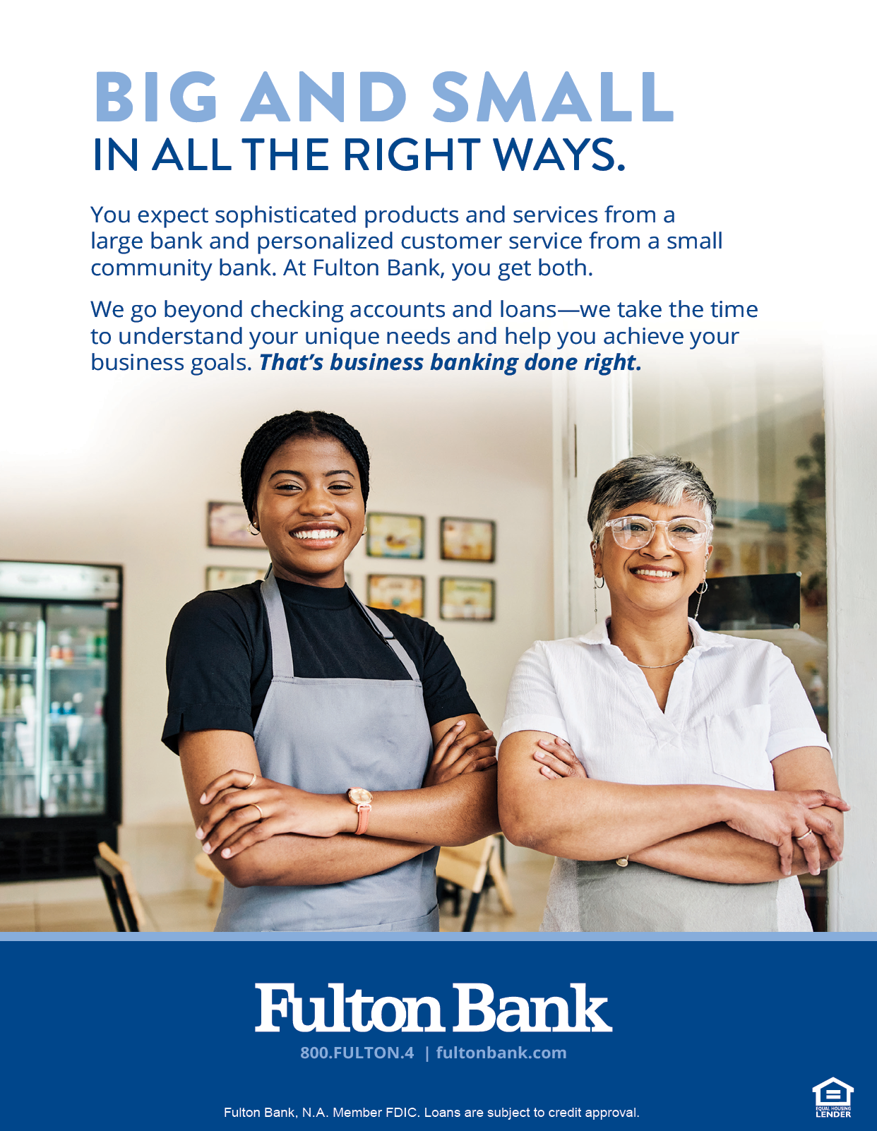 Two adults wearing aprons stand with arms crossed in a casual dining setting alongside text promoting Fulton Bank's personalized business banking services. Description generated by AI