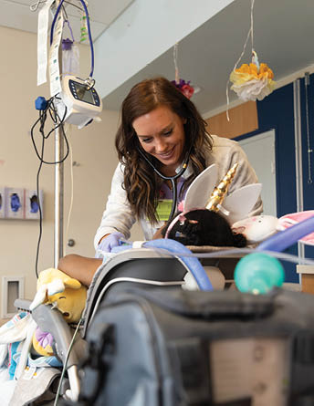 Inpatient Guide, pediatric medical teams, USA Health Children’s & Women’s Hospital Respiratory Therapist Thea Kehoe works with a patient at USA Health Children’s & Women’s Hospital
