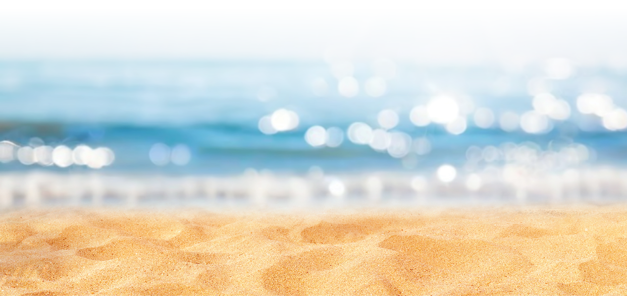Blurred defocused natural background of tropical summer beach with sparkling reflections on the water. Summer vacation concept.