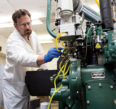 Jack Atkins working in the Petroleum Lab. (photo by Beth Wynn / © Mississippi State University)