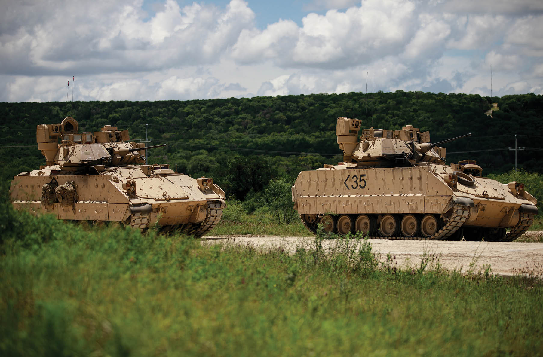 Soldiers from 3rd Armored Brigade Combat Team, 1st Cavalry Division position their M2A3 Bradley Fighting Vehicle during a defensive attack training exercise at Fort Hood Texas, July 9, 2021. (U.S. Army Photo by Staff Sgt. Daniel Herman)
