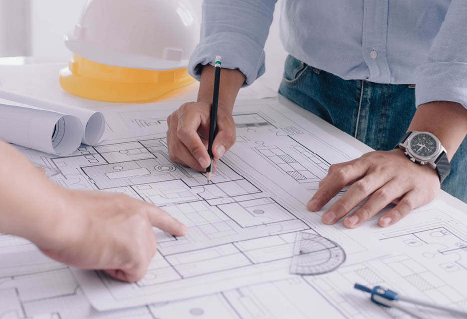 Two business man construction site engineer. Engineering tools on workplace Planning Design Draw Teamwork.