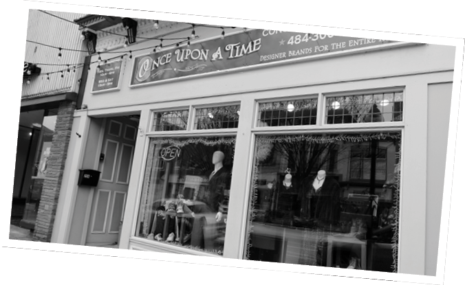 A storefront with a mannequin wearing a dress. AI generated content