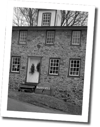A large brick building with a white door and a sign on the side. AI generated content
