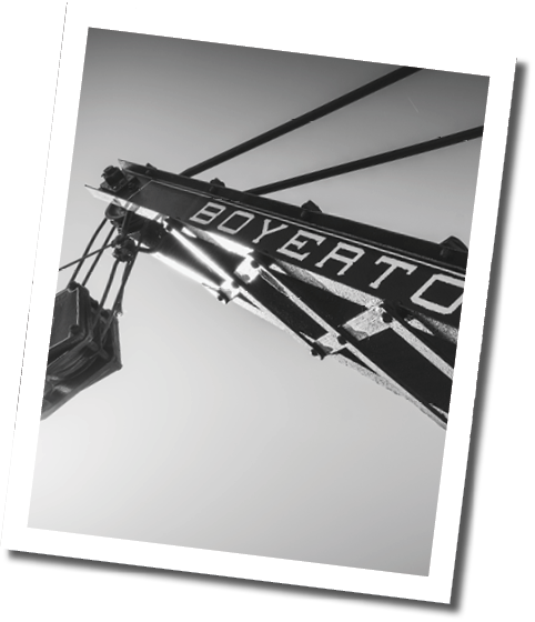 A crane with the name “Sovereign Town" written on it. AI generated content