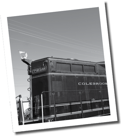 A black train engine with the words “Collebrookdale" written on the side. AI generated content