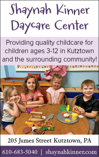 A group of children sitting around a table with a plate of food in front of them. AI generated content