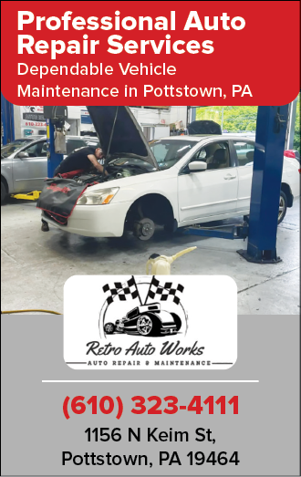 A white car is being worked on by a mechanic in a garage. AI generated content