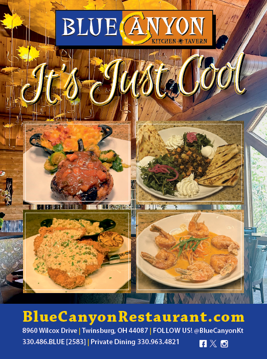 A blue canyon kitchen and tavern sign. Description generated by AI